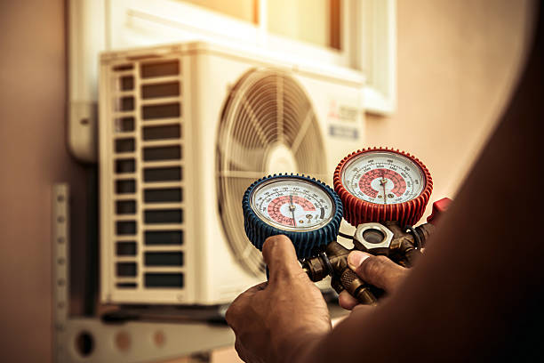 Professional Heat Pump Repair technician working in Marietta, GA